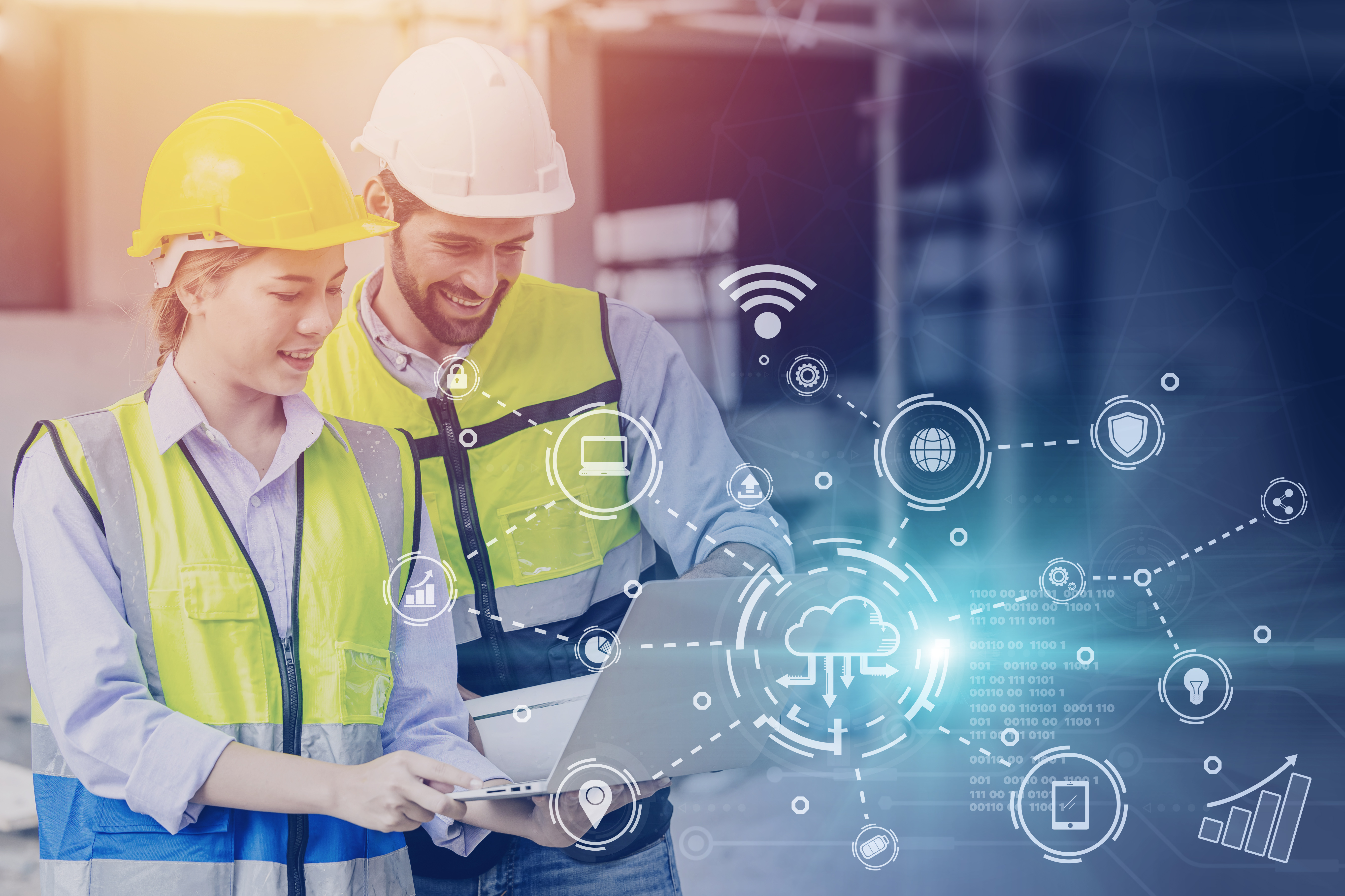 Construction professionals working with digital tools on a building site
